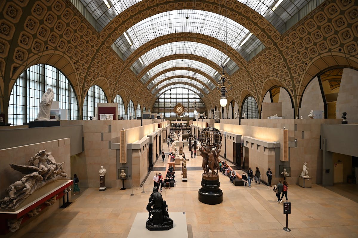 Walk along the Seine River towards Musée d'Orsay, home to an impressive collection of Impressionist art including works by Monet and Van Gogh.